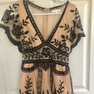 Black and nude romper